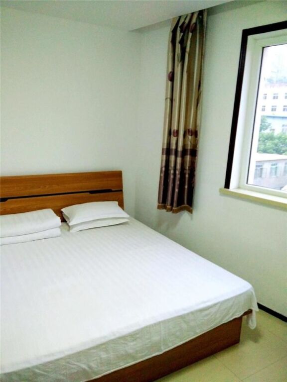 Далянь: Dalian Love Home Express Business Hotel