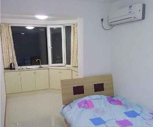 Яньтай: Yantai Haorenjia Apartment