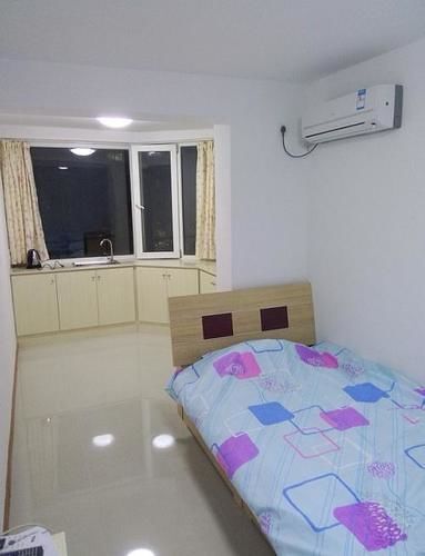 Яньтай: Yantai Haorenjia Apartment