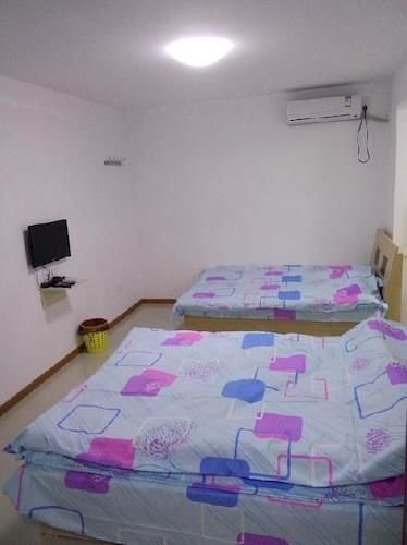 Яньтай: Yantai Haorenjia Apartment