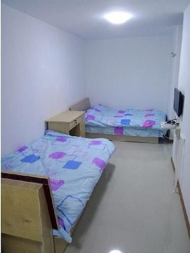 Яньтай: Yantai Haorenjia Apartment