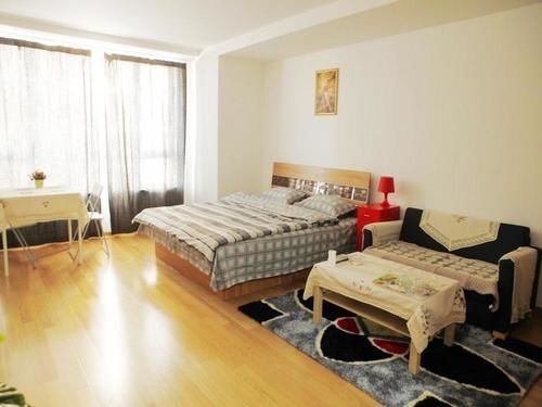 Далянь: Dalian Shangpinzhijia Apartment