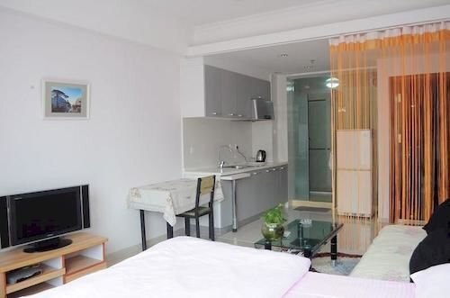 Далянь: Dalian Shangpinzhijia Apartment