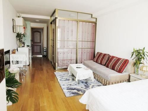 Далянь: Dalian Shangpinzhijia Apartment
