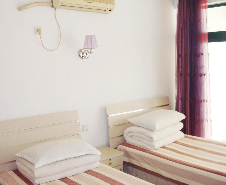 Циндао: Sea View Family Hotel- Qingdao