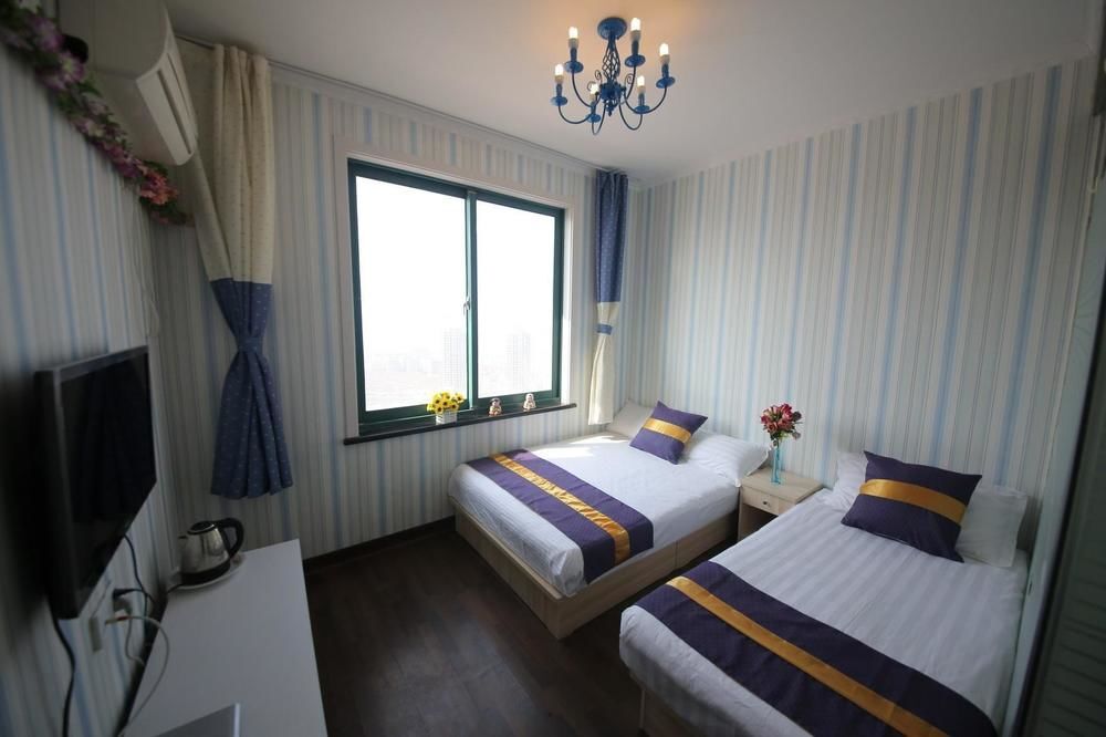 Циндао: Sea View Family Hotel- Qingdao