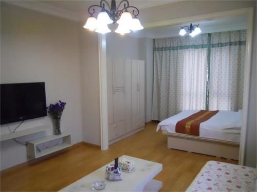 Далянь: Zuoan Classic Fashion Apartment