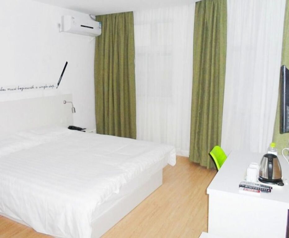Циндао: Home Inn