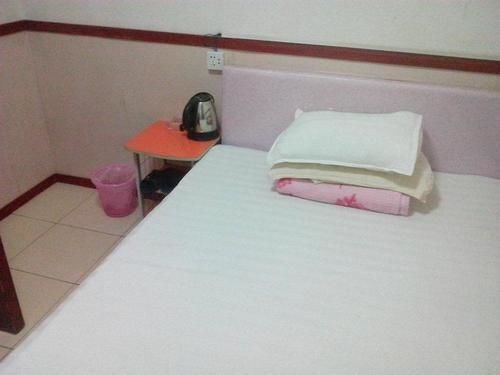 Лиаоченг: Xizhan Business Hotel