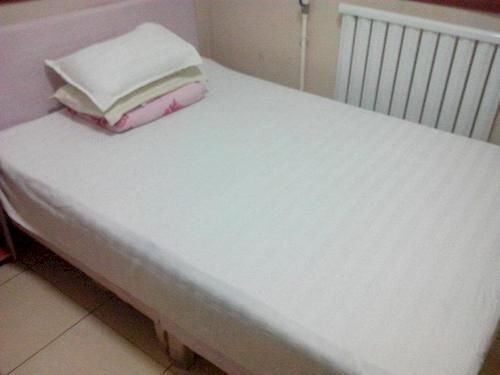 Лиаоченг: Xizhan Business Hotel