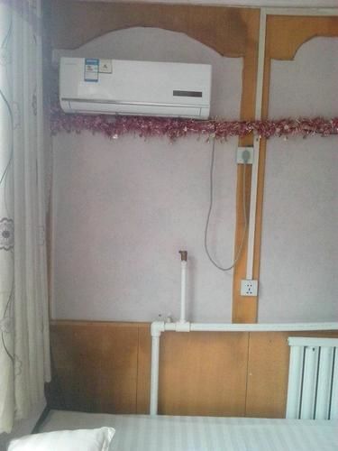 Лиаоченг: Xizhan Business Hotel