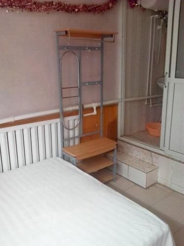 Лиаоченг: Xizhan Business Hotel