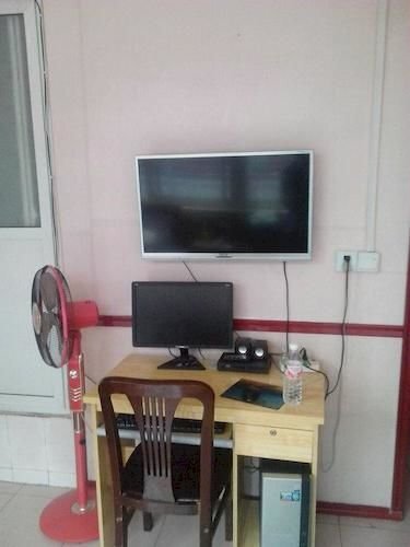 Лиаоченг: Xizhan Business Hotel