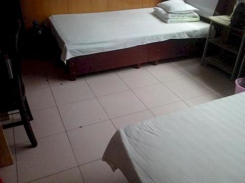 Лиаоченг: Xizhan Business Hotel