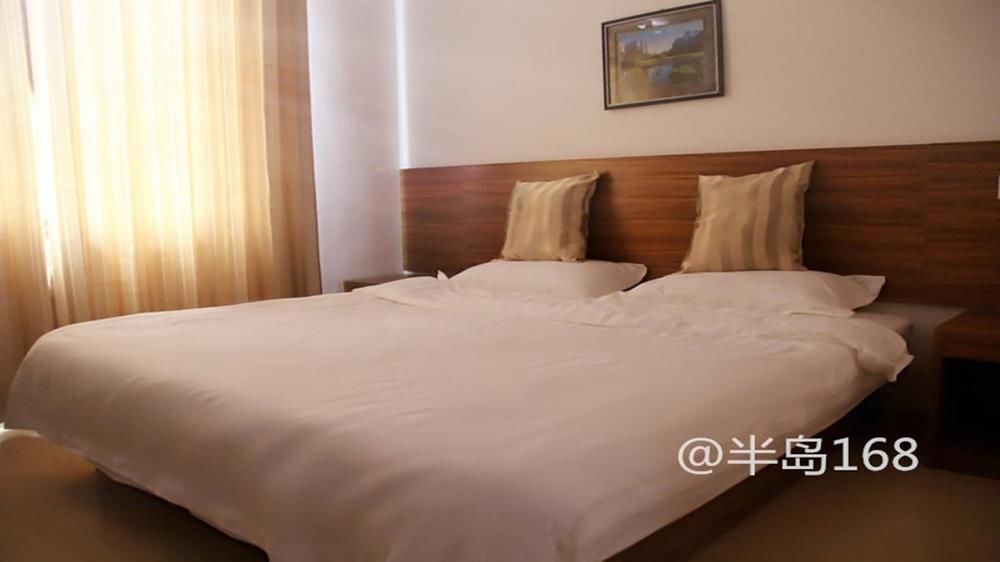 Циндао: Peninsula 168 Business Hotel- Qingdao