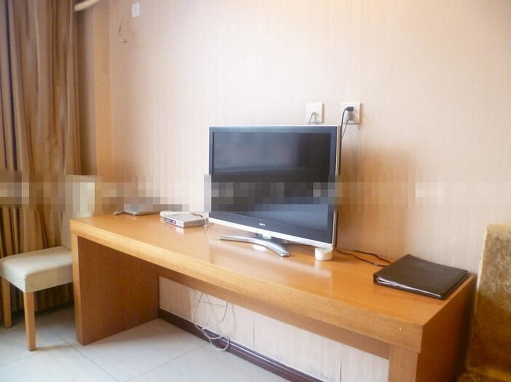 Лиаоченг: Tian Wai Tian Hotel