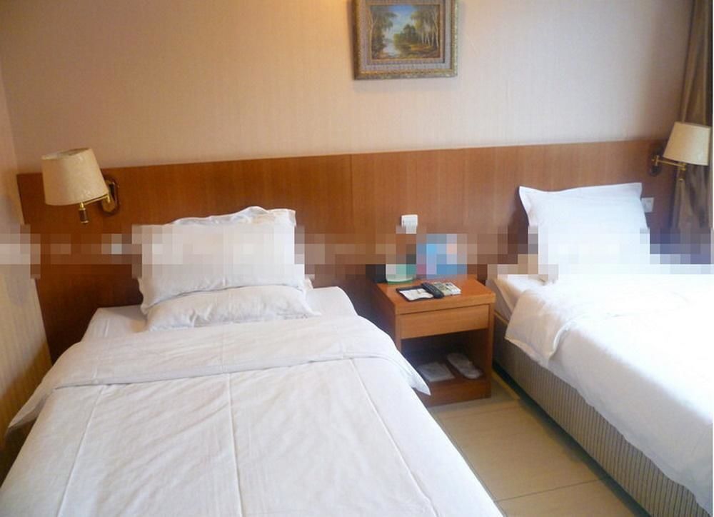 Лиаоченг: Tian Wai Tian Hotel