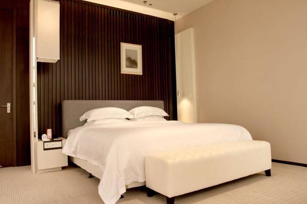 Таншань: Phoenix Business Hotel