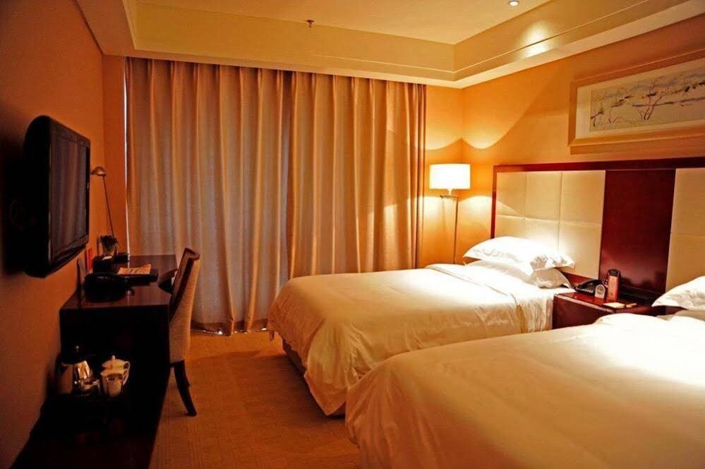 Таншань: Phoenix Business Hotel