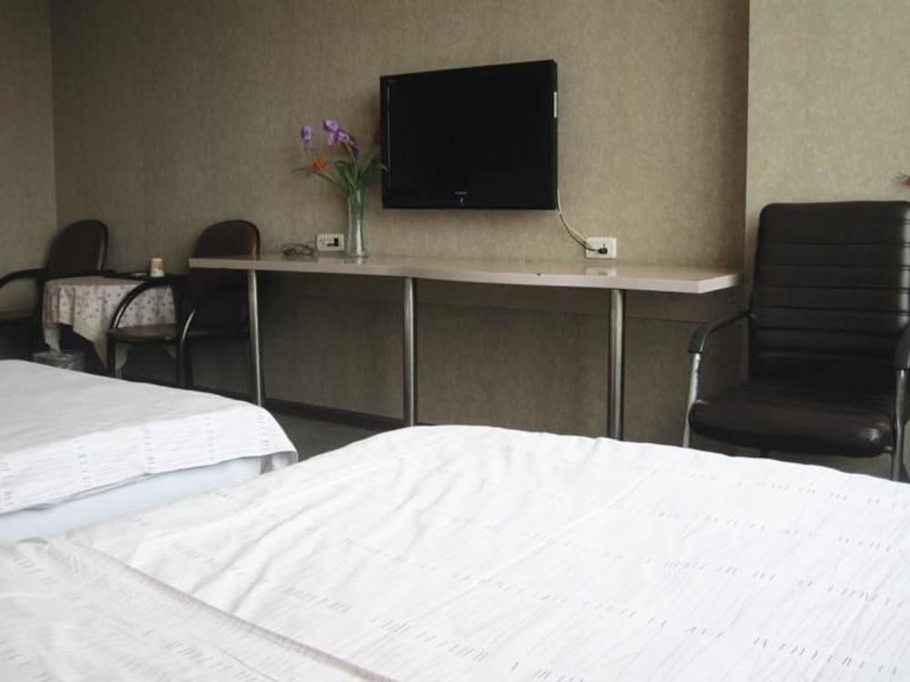 Ухань: Jiuzhou Business Hotel