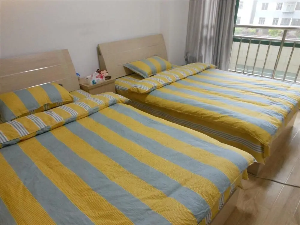 Куньмин: Jiujiu Happy Apartment