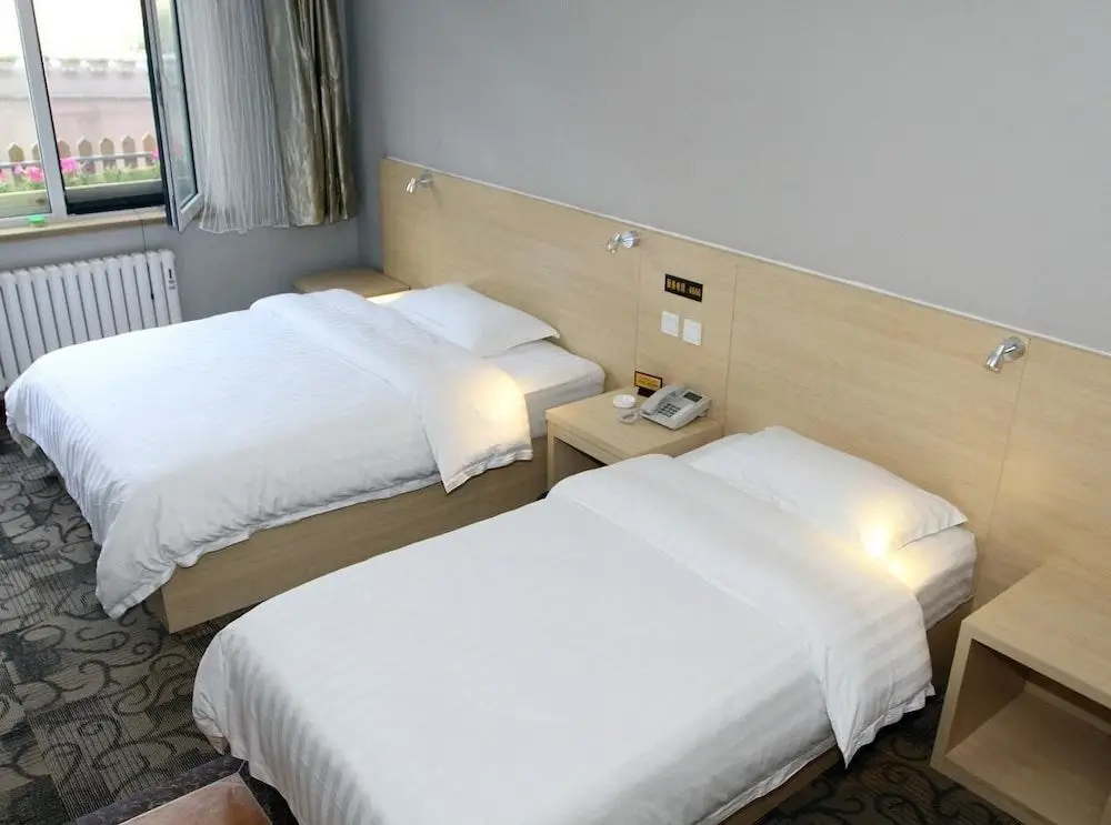 Циндао: Aizunke Hotel