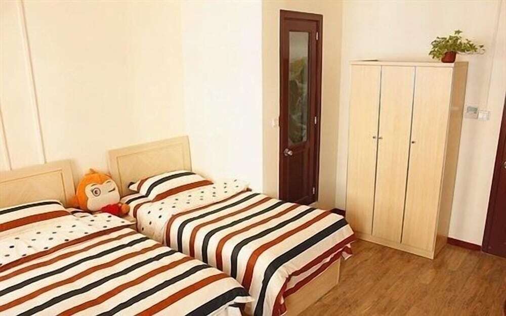 Циндао: Qingdao Yuezhu Topic Hostel