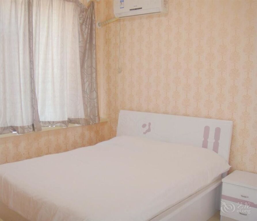Далянь: Dalian Xinghaijiaxin Apartment