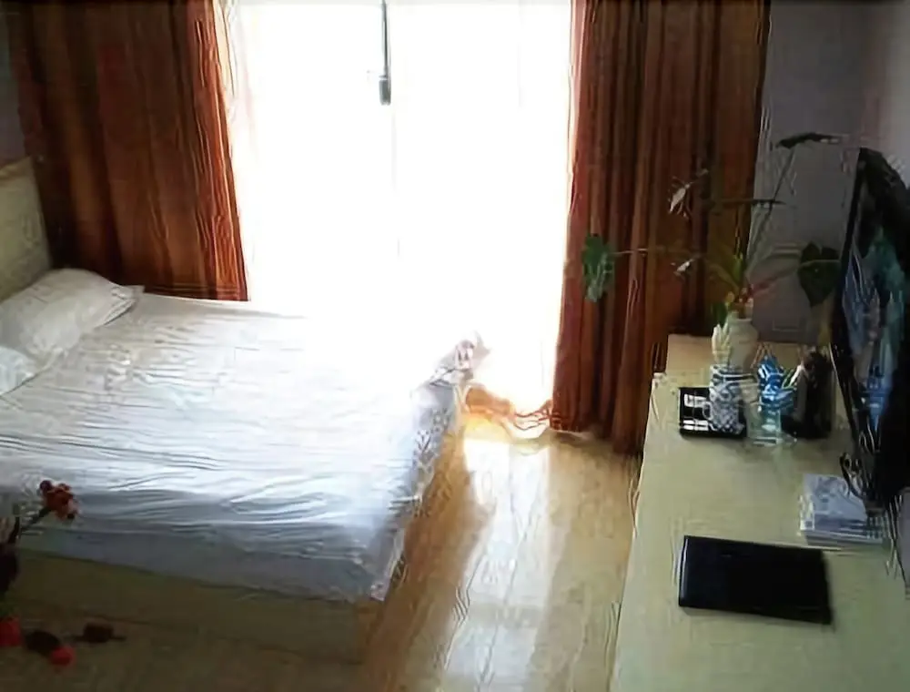 Нанкин: Super 8 by Wyndham Nanjing South Railway Station Yu Lan Lu