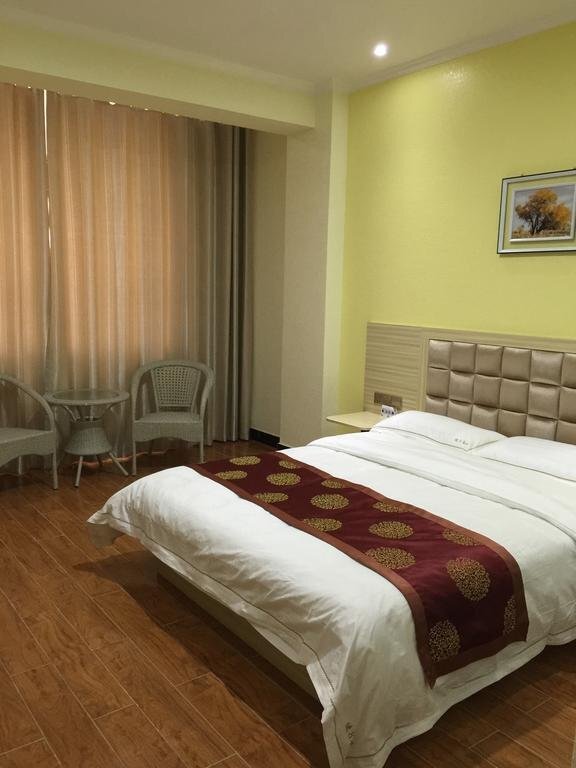 Цзюцюань: Super 8 by Wyndham Jiuquan Jinta Bus Station Jiu Hang Lu