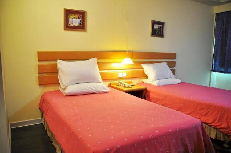 Иу: We Home Business Hotel