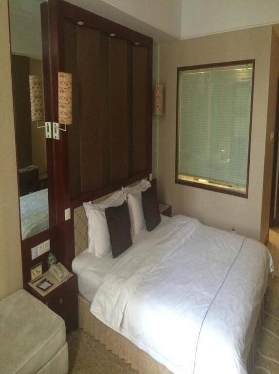 Корла: The Garden Hotel