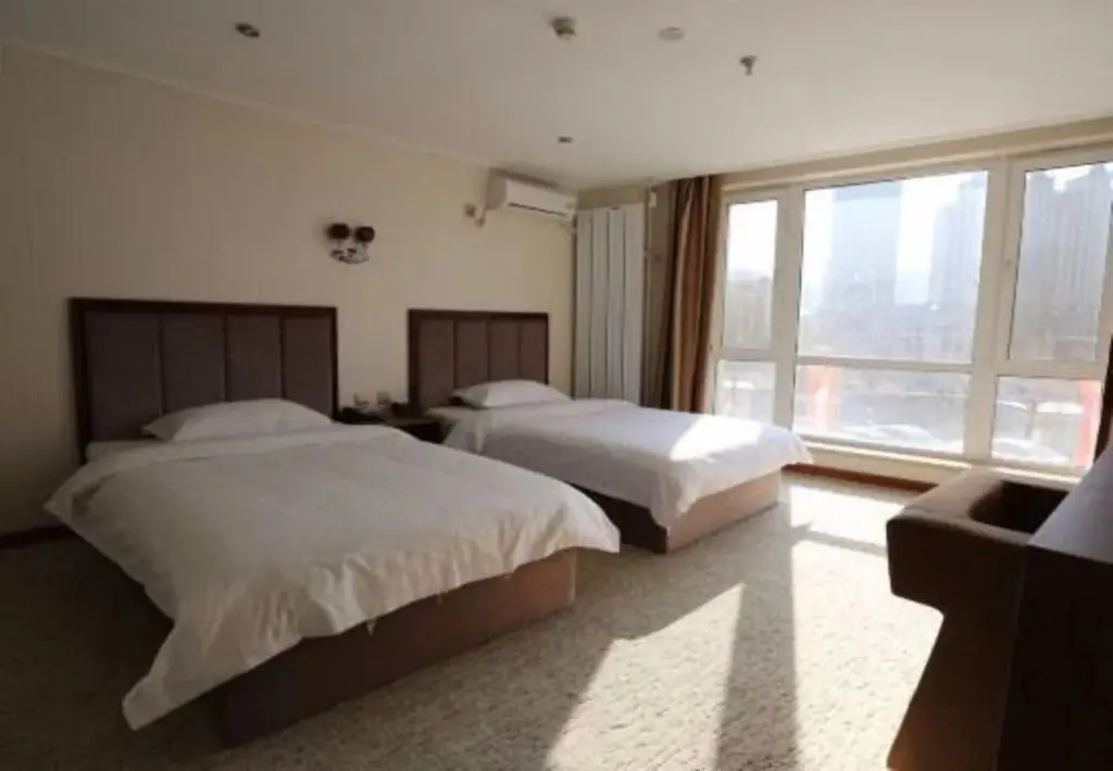 Далянь: Dalian Weijia Rainbow Hotel (Convention and Exhibition Center Branch)