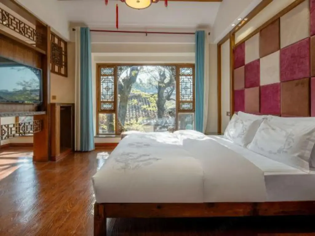 Лицзян: Jiuqi Fuxiang Inn (Lijiang Ancient City Dashuiche Branch)