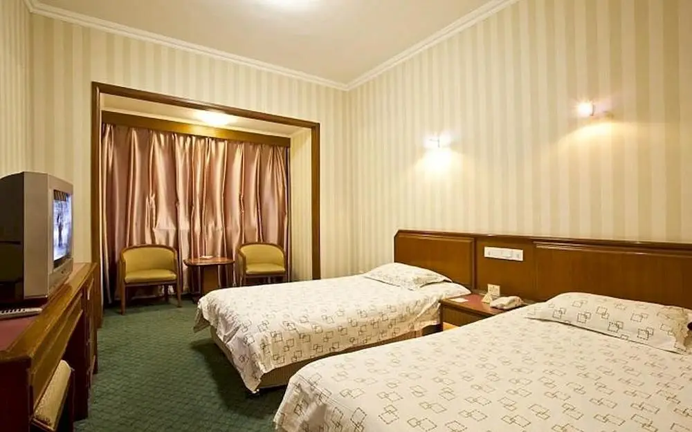 Уси: Rome Hotel
