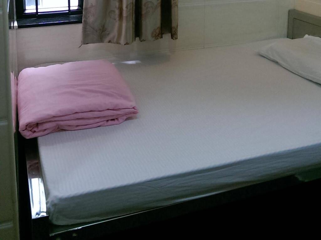 Гонконг: Hong Kong New York Guest House (TST Metro H Exit)