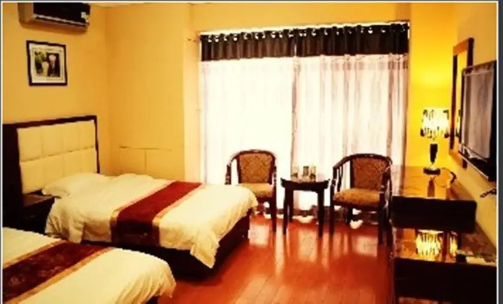 Чжэнчжоу: Manhattan Business Hotel Zhengzhou Shenglong Building Branch