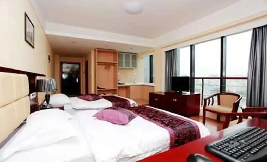 Чжэнчжоу: Manhattan Business Hotel Zhengzhou Shenglong Building Branch