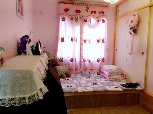 Пекин: Huan Le Gu Warm House