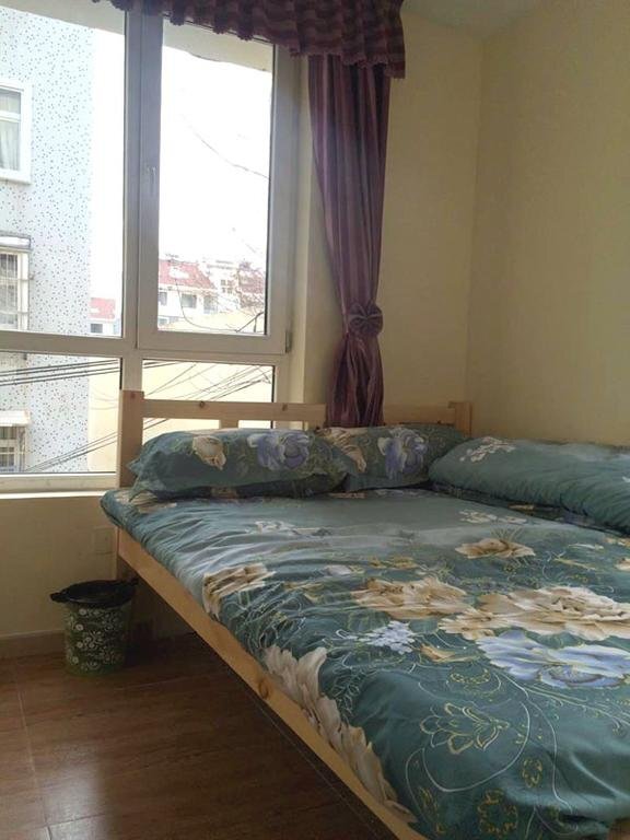 Циндао: Qingdao Shuimu Holiday Hotel