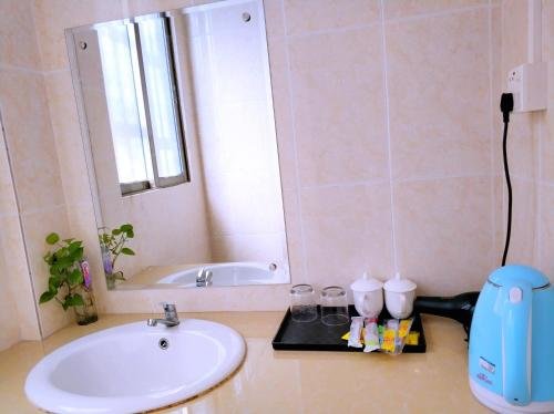 Гуанчжоу: Guangzhou South Railway Station Xingtu Boutique Apartment