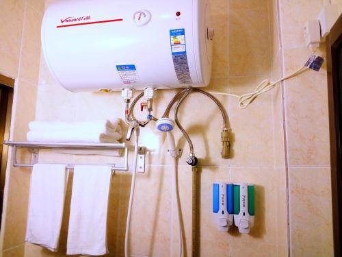 Гуанчжоу: Guangzhou South Railway Station Xingtu Boutique Apartment