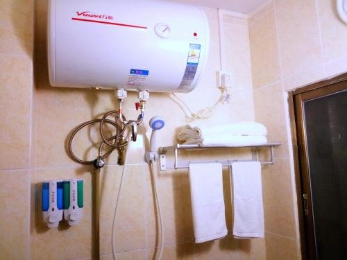Гуанчжоу: Guangzhou South Railway Station Xingtu Boutique Apartment