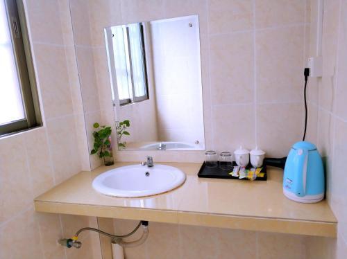 Гуанчжоу: Guangzhou South Railway Station Xingtu Boutique Apartment