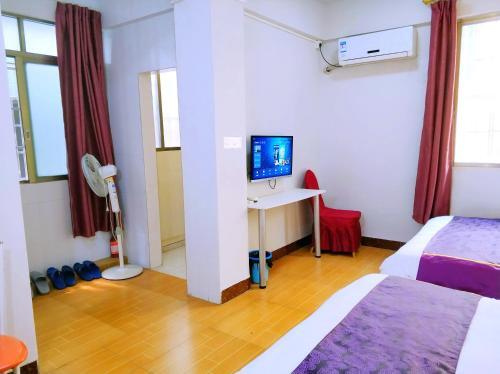 Гуанчжоу: Guangzhou South Railway Station Xingtu Boutique Apartment