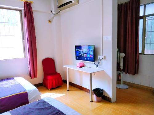Гуанчжоу: Guangzhou South Railway Station Xingtu Boutique Apartment