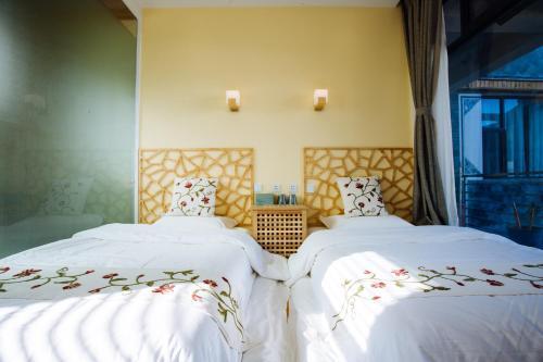 Дали: Dali Xiamu Inn