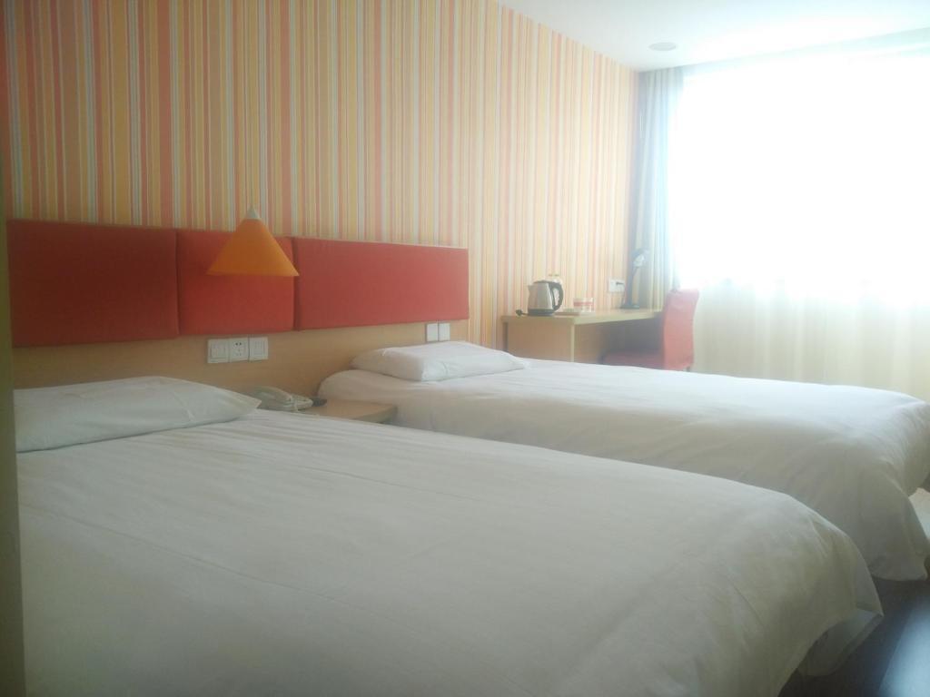 Циндао: Enjoy Inn