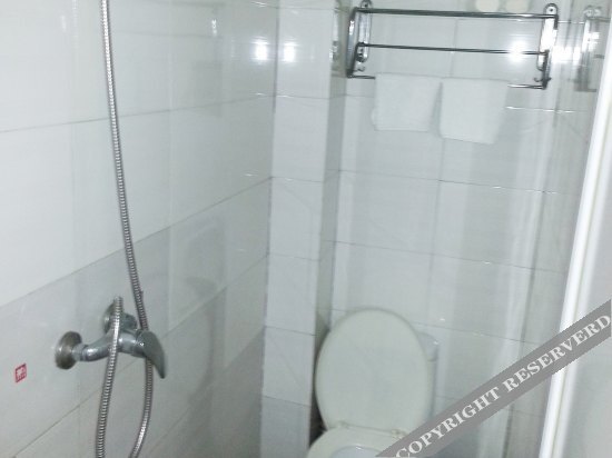 Хуаншань: Jiuwu Business Hotel