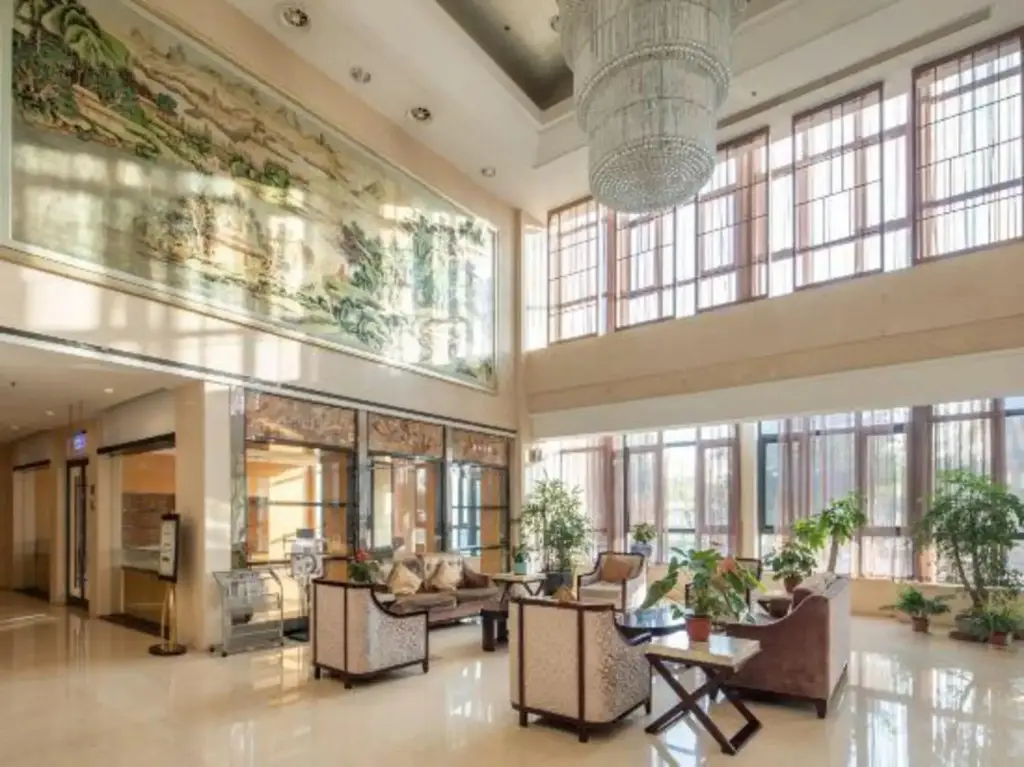 Уси: New Continental June House Hotel